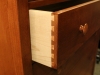 Half blind dovetails on the drawers.